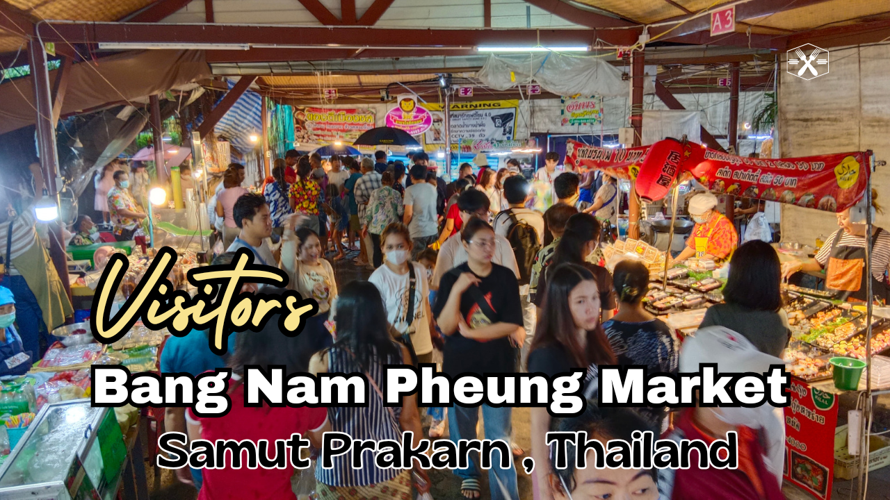 visitors at the thai weekend market in samut prakarn