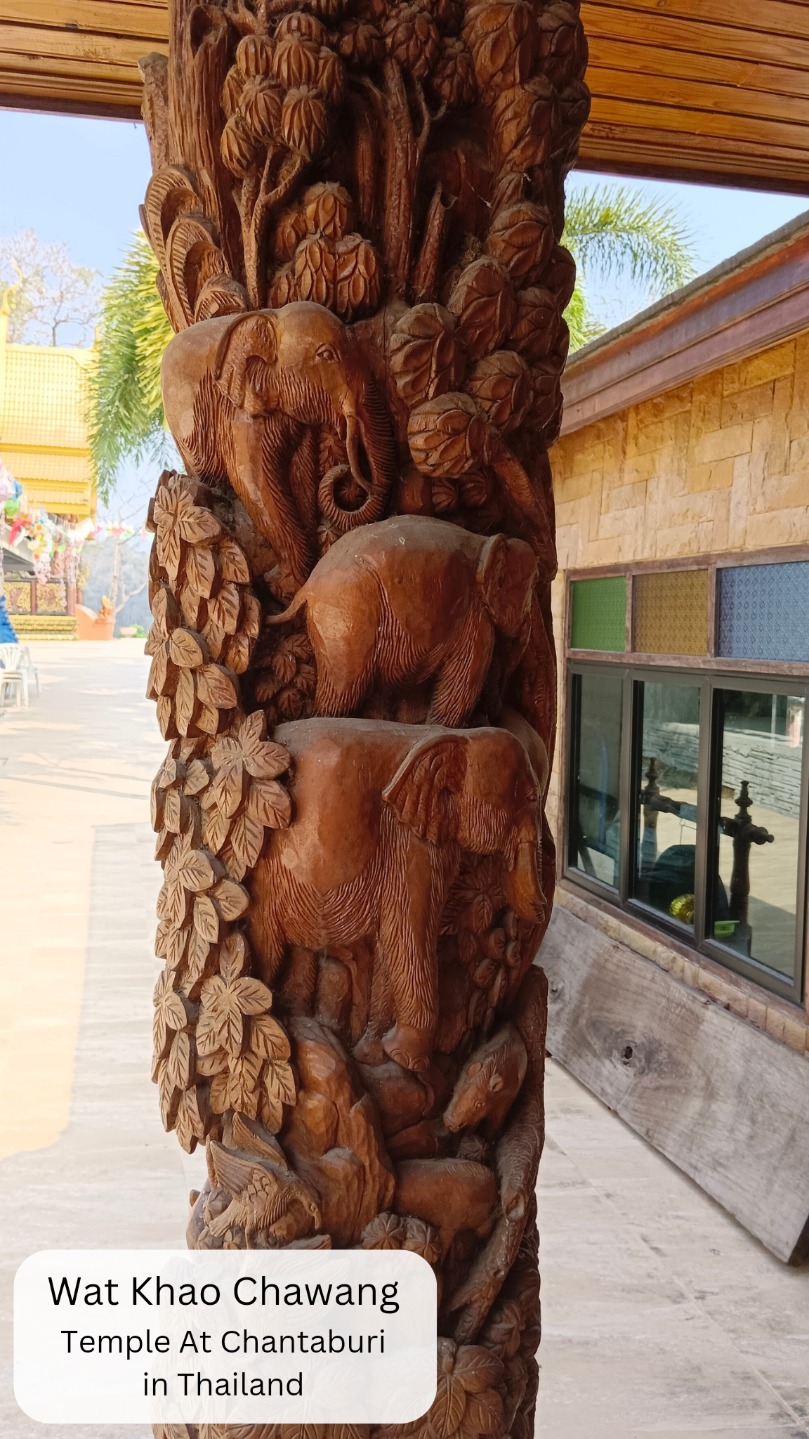 carved tree trunk thailand at wat khao chawang chantaburi